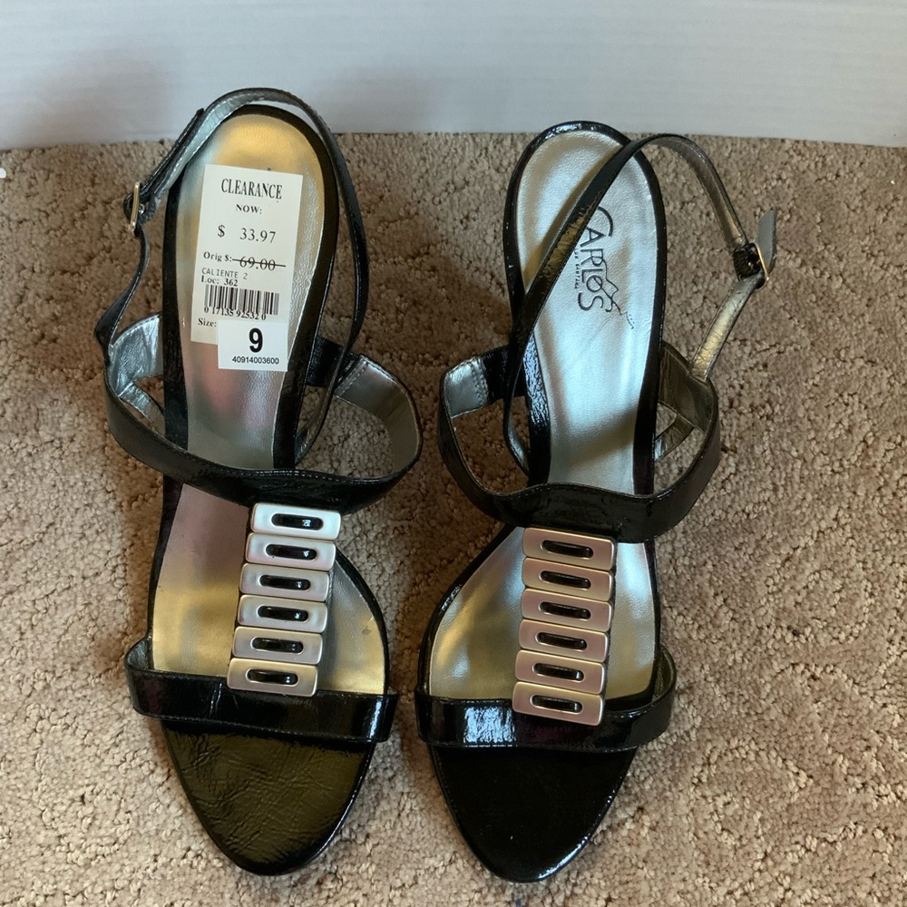 Carlos Santana black heels